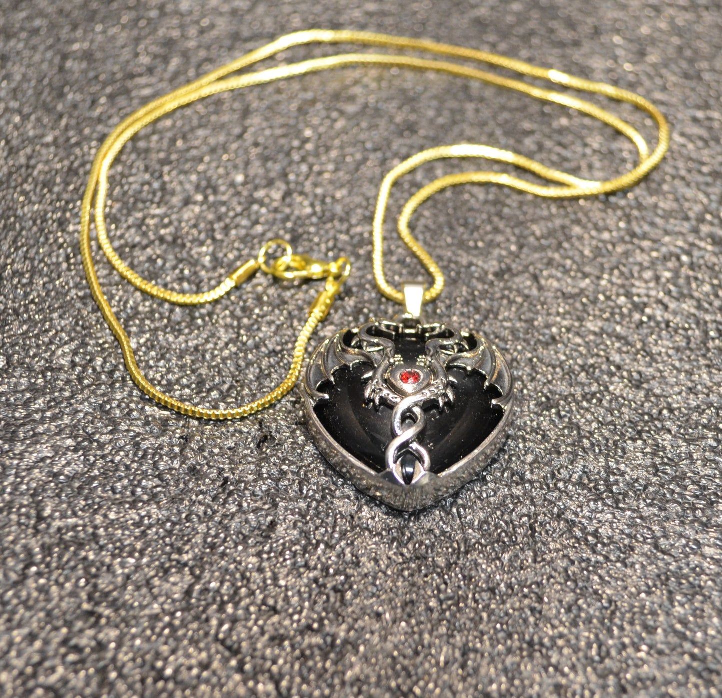 BLACK OBSIDAN DRAGON HEART PENTANT WITH GOLD FLAT PERESSED CROSS NECKLESS